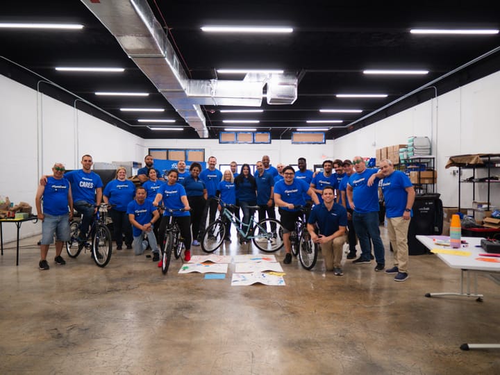 Freebee Cares - Donating bikes and helmets to Lotus House Miami.